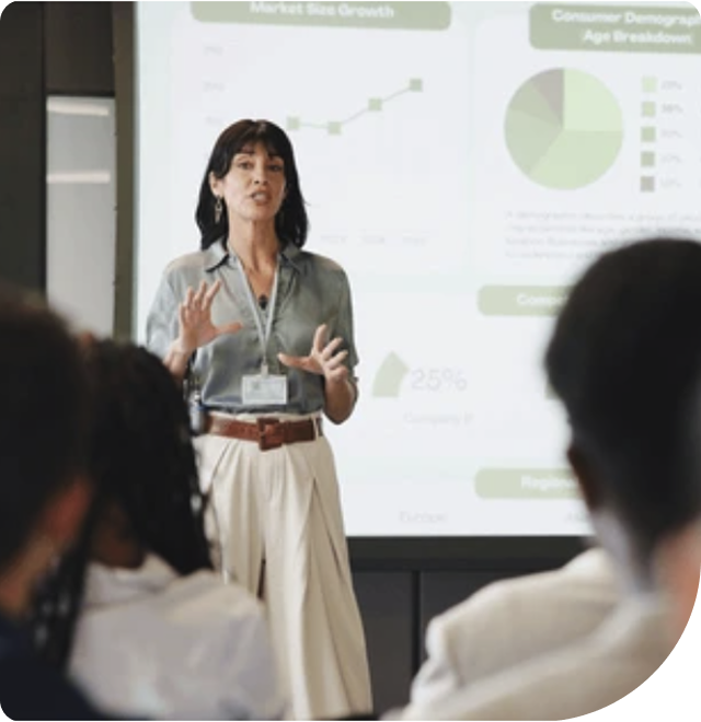 Professional woman leading a presentation in front of colleagues.